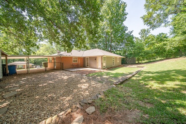813 Crockett Dr, Columbus, GA 31904 - rear view of house featuring a gate and a patio area