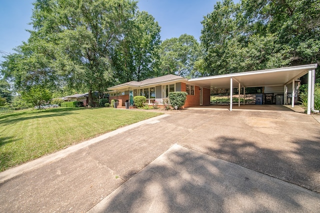 813 Crockett Dr, Columbus, GA 31904 - view of front of property with driveway, a front lawn, and an attached carport