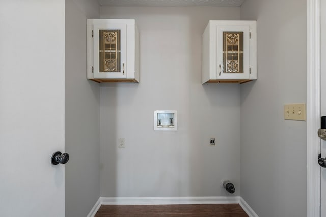 laundry room with hookup for a washing machine, hookup for an electric dryer, dark wood-style floors, and baseboards