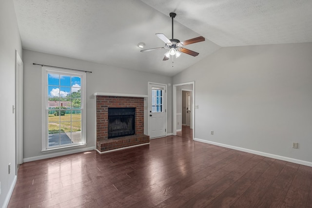 unfurnished living room featuring a healthy amount of sunlight, wood finished floors, and ceiling fan