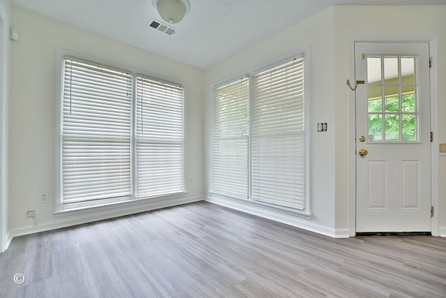 84 Summerbrook Loop, Smiths Station, AL 36870 - interior space with baseboards, wood finished floors, and visible vents