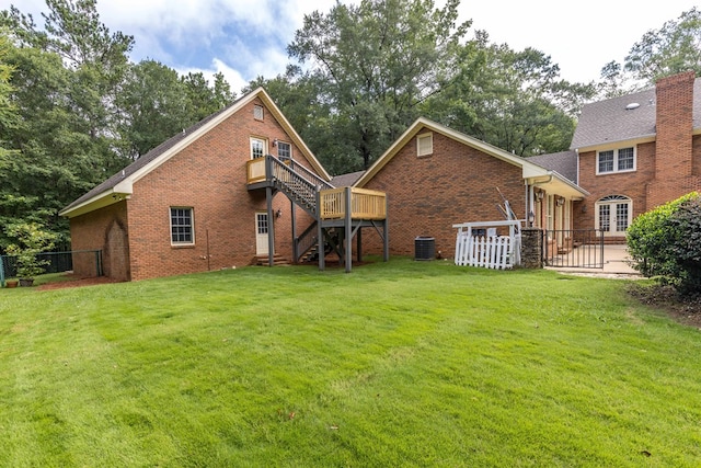 5110 Midland Trce, Columbus, GA 31820 - back of property with brick siding, stairway, and a deck
