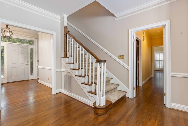 5110 Midland Trce, Columbus, GA 31820 - foyer featuring wood finished floors, stairway, crown molding, and a chandelier