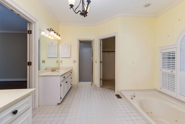 5110 Midland Trce, Columbus, GA 31820 - bathroom with vanity, a whirlpool tub, a chandelier, crown molding, and tile patterned flooring