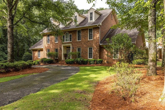 5110 Midland Trce, Columbus, GA 31820 - colonial home with brick siding, driveway, a front yard, and roof with shingles