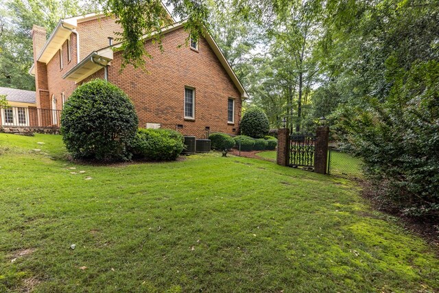 5110 Midland Trce, Columbus, GA 31820 - view of property exterior with brick siding and a chimney