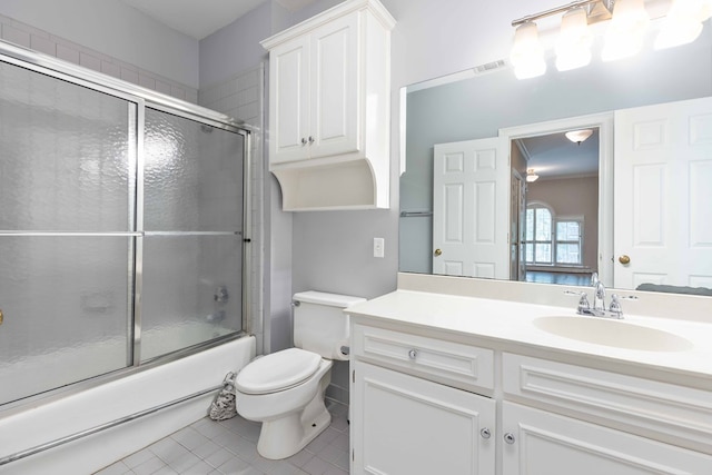 5110 Midland Trce, Columbus, GA 31820 - full bath with tile patterned floors, vanity, and shower / bath combination with glass door