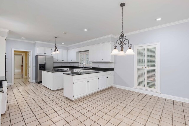5110 Midland Trce, Columbus, GA 31820 - kitchen featuring stainless steel refrigerator with ice dispenser, dark countertops, light tile patterned floors, white cabinetry, and crown molding
