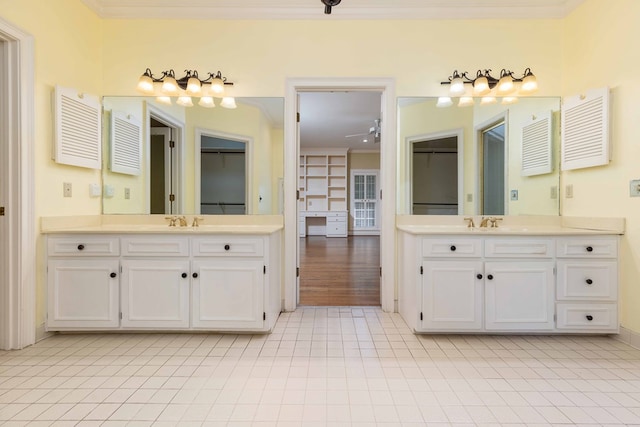 5110 Midland Trce, Columbus, GA 31820 - full bathroom with crown molding, two vanities, tile patterned floors, and a closet