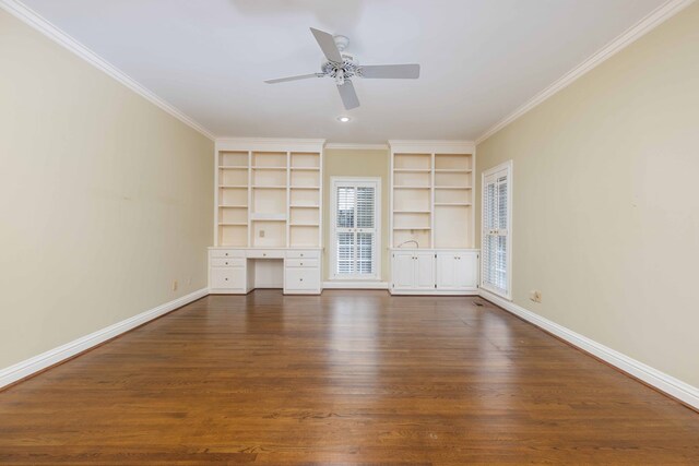 5110 Midland Trce, Columbus, GA 31820 - unfurnished living room featuring built in study area, built in shelves, ceiling fan, and dark wood-style floors