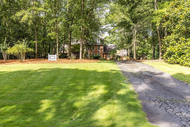 5110 Midland Trce, Columbus, GA 31820 - view of front of property with asphalt driveway and a front yard