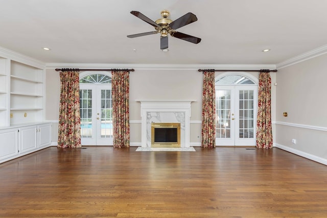 5110 Midland Trce, Columbus, GA 31820 - unfurnished living room with french doors, healthy amount of natural light, wood finished floors, ornamental molding, and recessed lighting