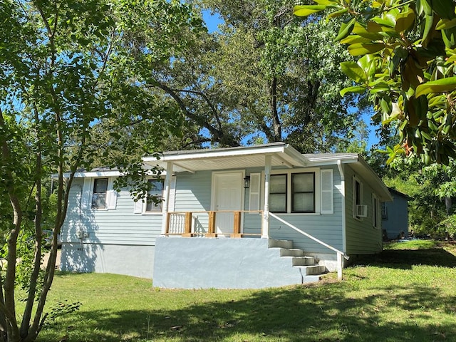50 Old Opelika Rd, Phenix City, AL 36870 - view of front of home with a front yard and covered porch