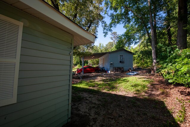 50 Old Opelika Rd, Phenix City, AL 36870 - view of yard featuring a carport