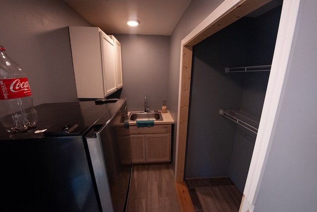 50 Old Opelika Rd, Phenix City, AL 36870 - washroom featuring a sink and wood finished floors