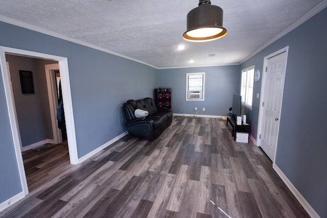 50 Old Opelika Rd, Phenix City, AL 36870 - sitting room with dark wood-type flooring, baseboards, ornamental molding, a textured ceiling, and cooling unit