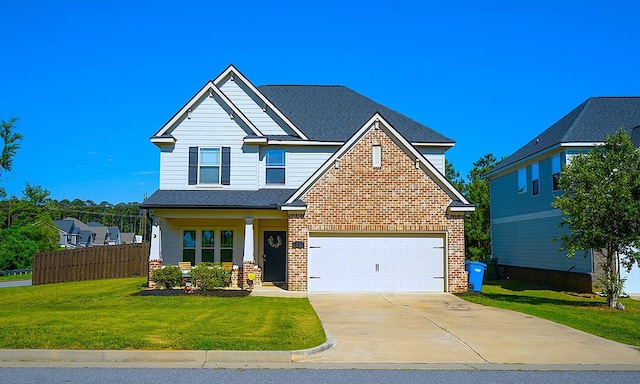 8840 Sullivans Dr, Midland, GA 31820 - view of front of home with concrete driveway, brick siding, and covered porch