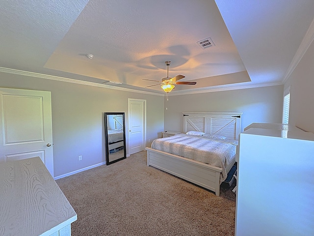 8840 Sullivans Dr, Midland, GA 31820 - bedroom featuring a tray ceiling, baseboards, light colored carpet, ornamental molding, and ceiling fan