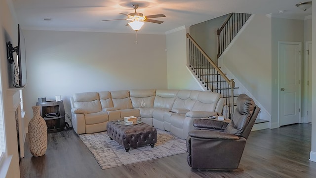 8840 Sullivans Dr, Midland, GA 31820 - living room featuring wood finished floors, a ceiling fan, crown molding, stairway, and baseboards