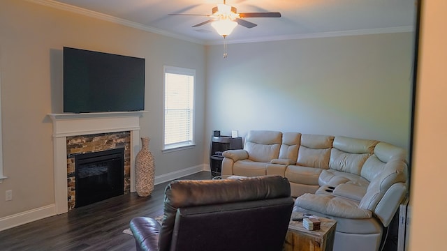 8840 Sullivans Dr, Midland, GA 31820 - living area with a ceiling fan, dark wood-type flooring, baseboards, ornamental molding, and a stone fireplace