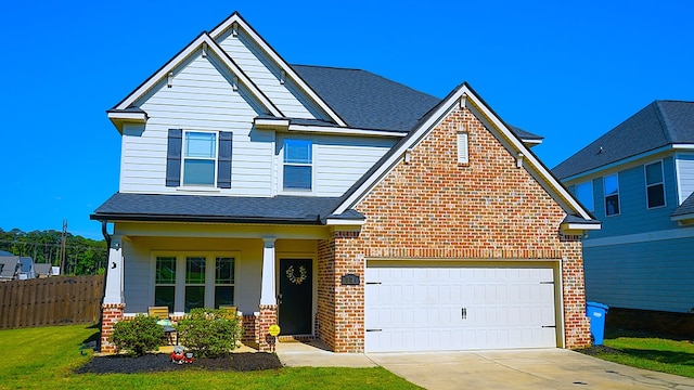 8840 Sullivans Dr, Midland, GA 31820 - traditional-style house with brick siding, roof with shingles, driveway, a porch, and an attached garage