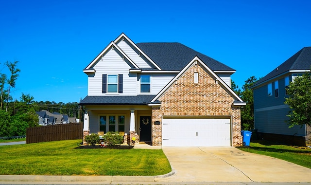 8840 Sullivans Dr, Midland, GA 31820 - view of front of property featuring driveway, brick siding, a garage, and a porch