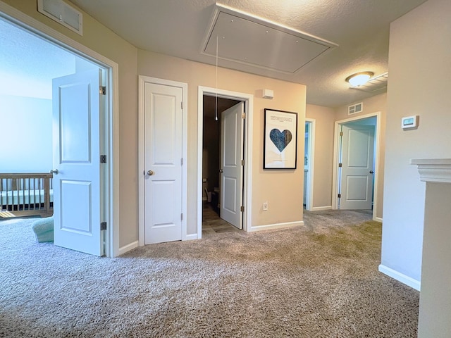 8840 Sullivans Dr, Midland, GA 31820 - unfurnished room featuring attic access, carpet flooring, and baseboards