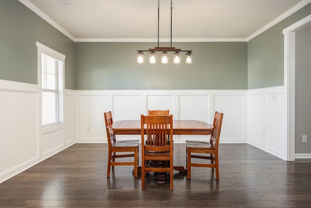 dining area featuring dark hardwood / wood-style flooring and ornamental molding