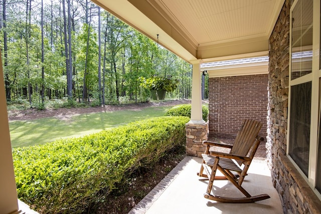 3450 Mckee Rd, Upatoi, GA 31829 - covered porch featuring a lawn