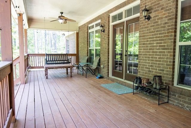 3450 Mckee Rd, Upatoi, GA 31829 - wooden porch with a ceiling fan