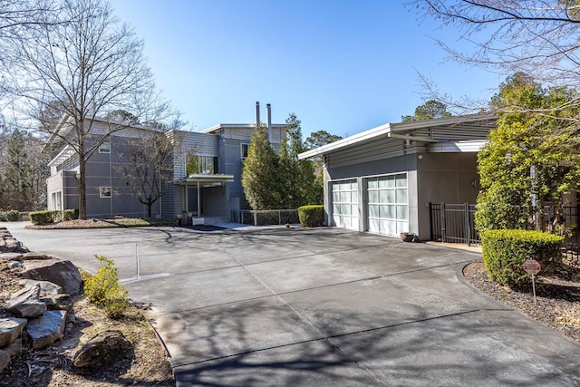 exterior space with a garage