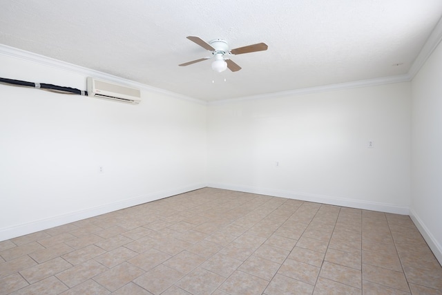 spare room with a wall unit AC, crown molding, and a textured ceiling