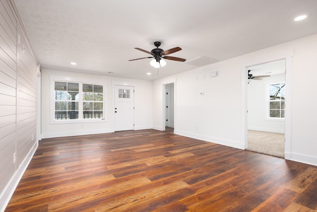 spare room with a ceiling fan, baseboards, dark wood-style flooring, and recessed lighting