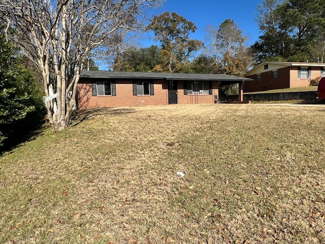 ranch-style house with a front lawn