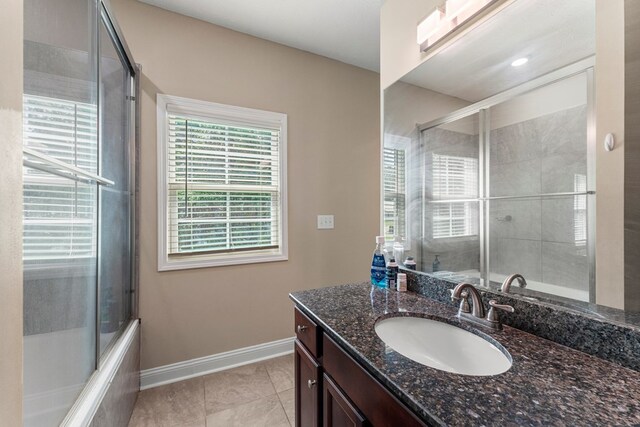 344 Lee Road 2040, Phenix City, AL 36870 - full bath featuring tile patterned flooring, vanity, and shower / bath combination with glass door