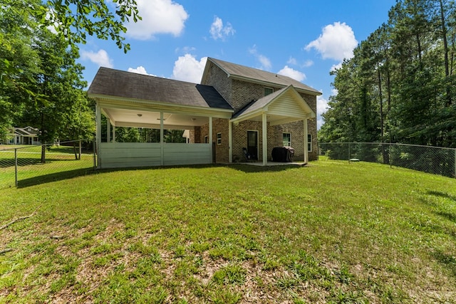 344 Lee Road 2040, Phenix City, AL 36870 - back of property featuring a fenced backyard and brick siding