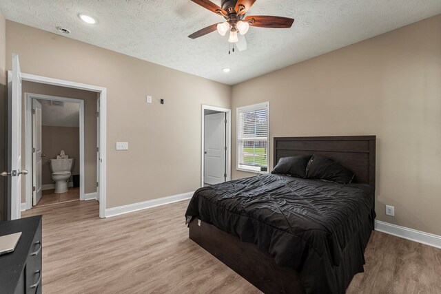344 Lee Road 2040, Phenix City, AL 36870 - bedroom featuring light wood-type flooring, a textured ceiling, ceiling fan, and recessed lighting