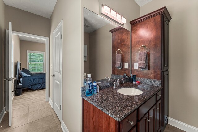 344 Lee Road 2040, Phenix City, AL 36870 - ensuite bathroom with vanity and tile patterned floors