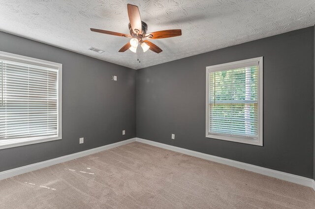 344 Lee Road 2040, Phenix City, AL 36870 - empty room with ceiling fan, carpet floors, and a textured ceiling