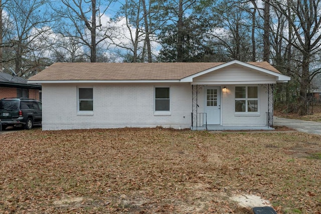 ranch-style home with covered porch