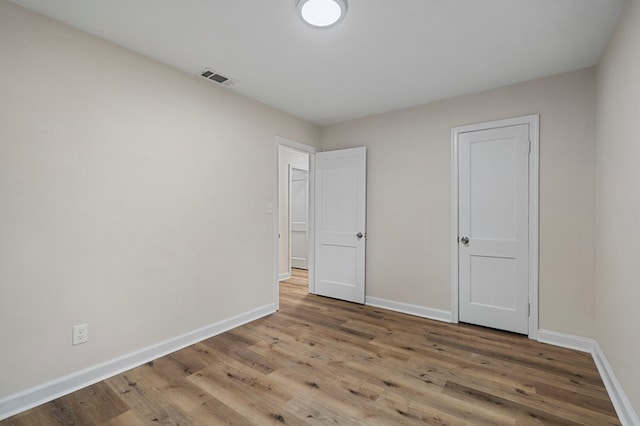 1474 Brewer Ave, Columbus, GA 31903 - unfurnished bedroom featuring wood-type flooring