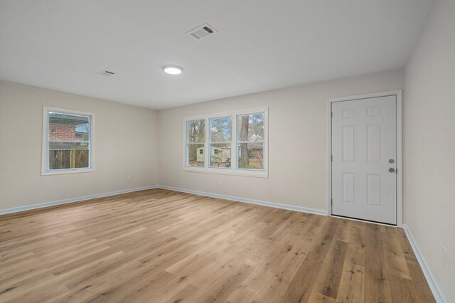 1474 Brewer Ave, Columbus, GA 31903 - spare room featuring light hardwood / wood-style flooring and plenty of natural light