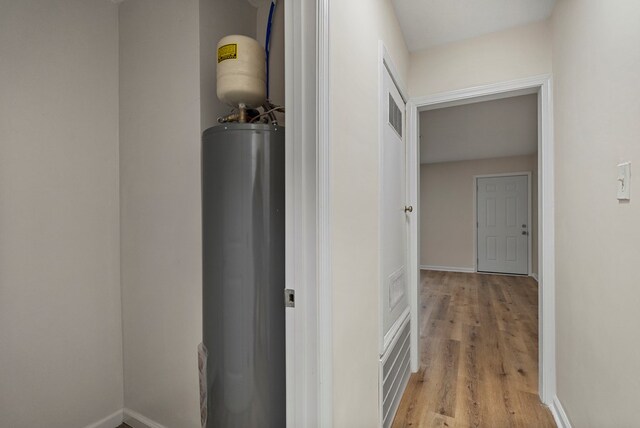 1474 Brewer Ave, Columbus, GA 31903 - corridor with light hardwood / wood-style floors and gas water heater