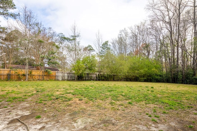 view of yard featuring fence