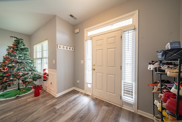 foyer with dark hardwood / wood-style floors