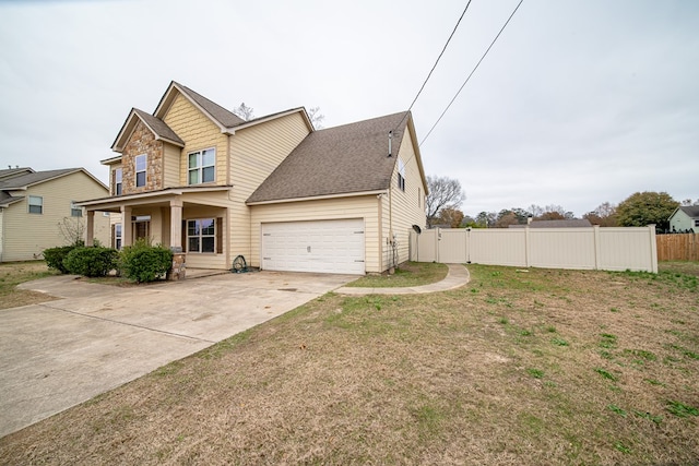 view of front of property with covered porch and a front lawn