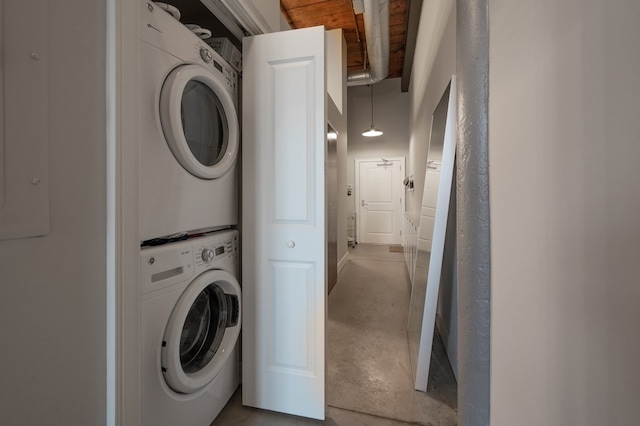 1201 Front Ave Unit 419, Columbus, GA 31901 - washroom with stacked washer / dryer