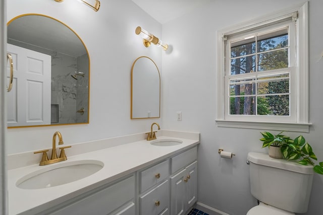 4975 Glacier Dr, Columbus, GA 31907 - bathroom with double vanity and a shower