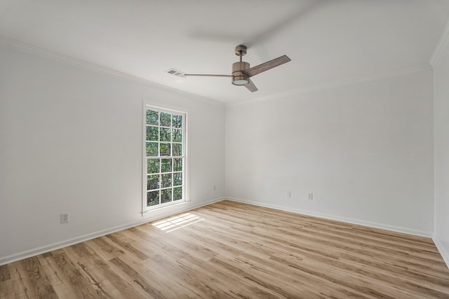 4975 Glacier Dr, Columbus, GA 31907 - spare room with ornamental molding, light wood-style floors, and a ceiling fan
