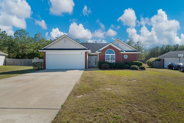 ranch-style home with a front yard and a garage